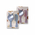 Distribuidora La Frontera blue and pink deer-ear mirror and comb sets for children. Each set includes a handheld mirror and a comb.
